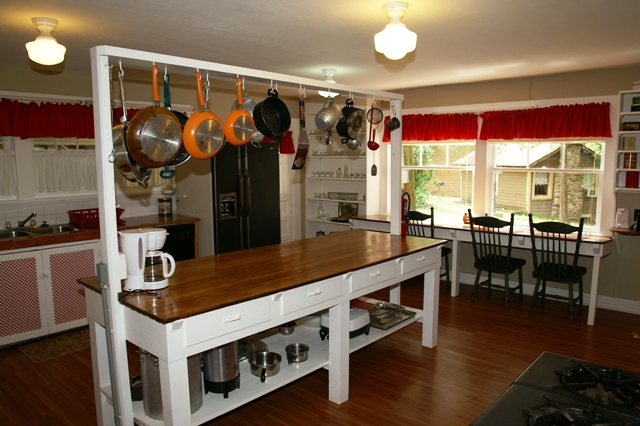 kitchen with hanging pot and pan rack
