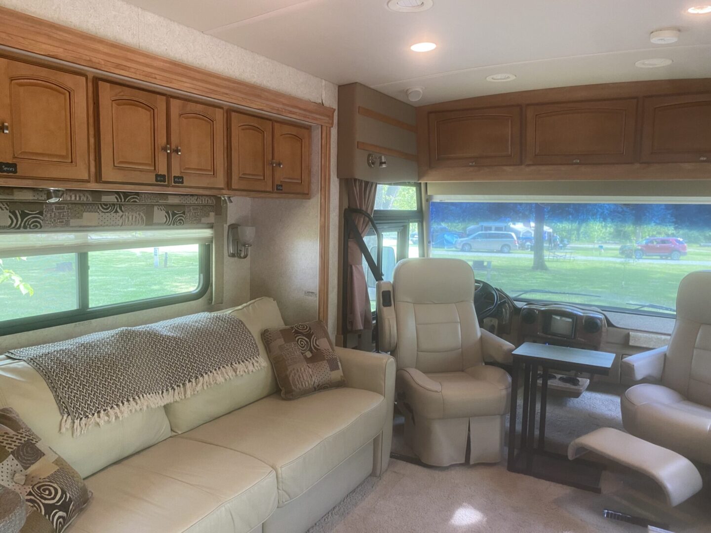 A living room with a couch and chair in it